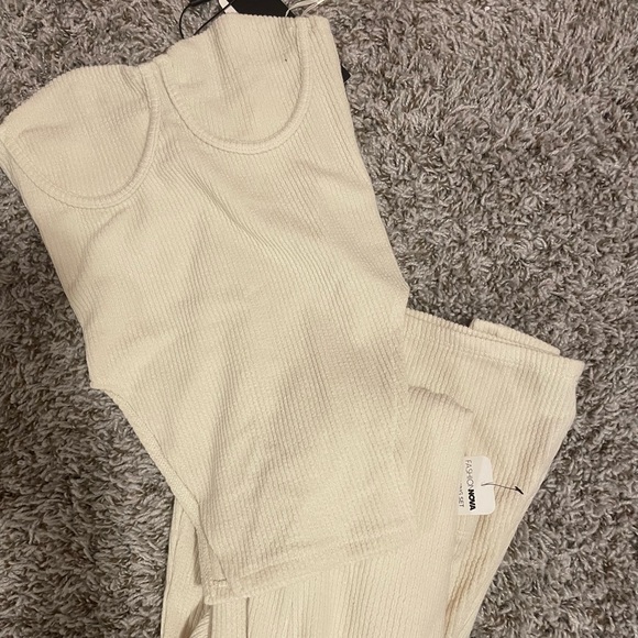 Got this two piece set but its to small for me so here if anyone wants,very new! - Picture 2 of 3